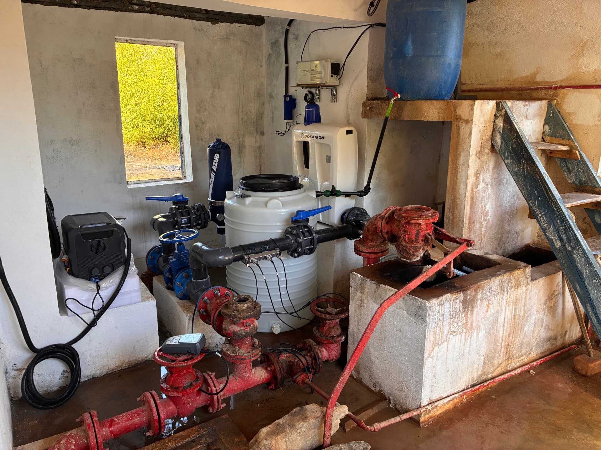 Installed WATA-Dosatron chlorination system in Madagascar with dosing equipment, tanks and pipework.