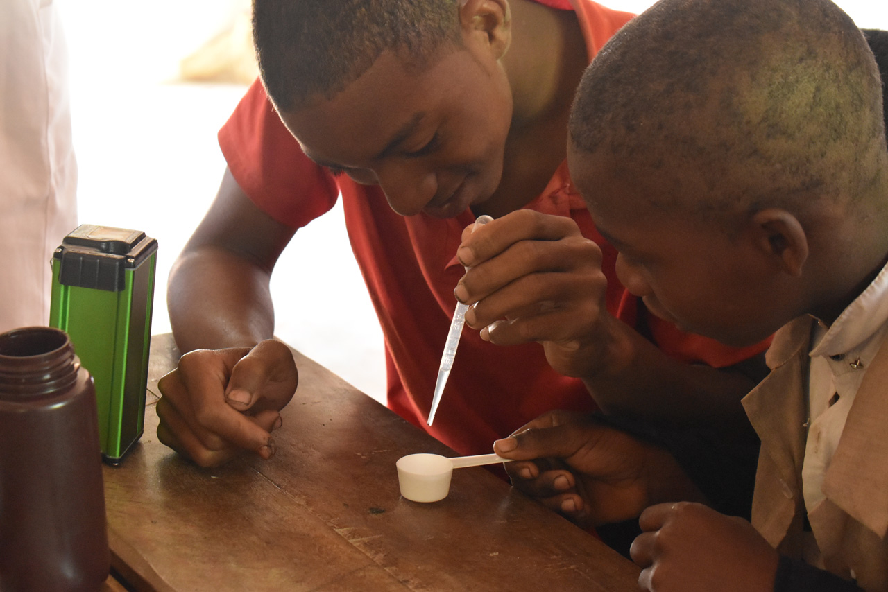 Operators practising chlorine quality control during a WATA training session